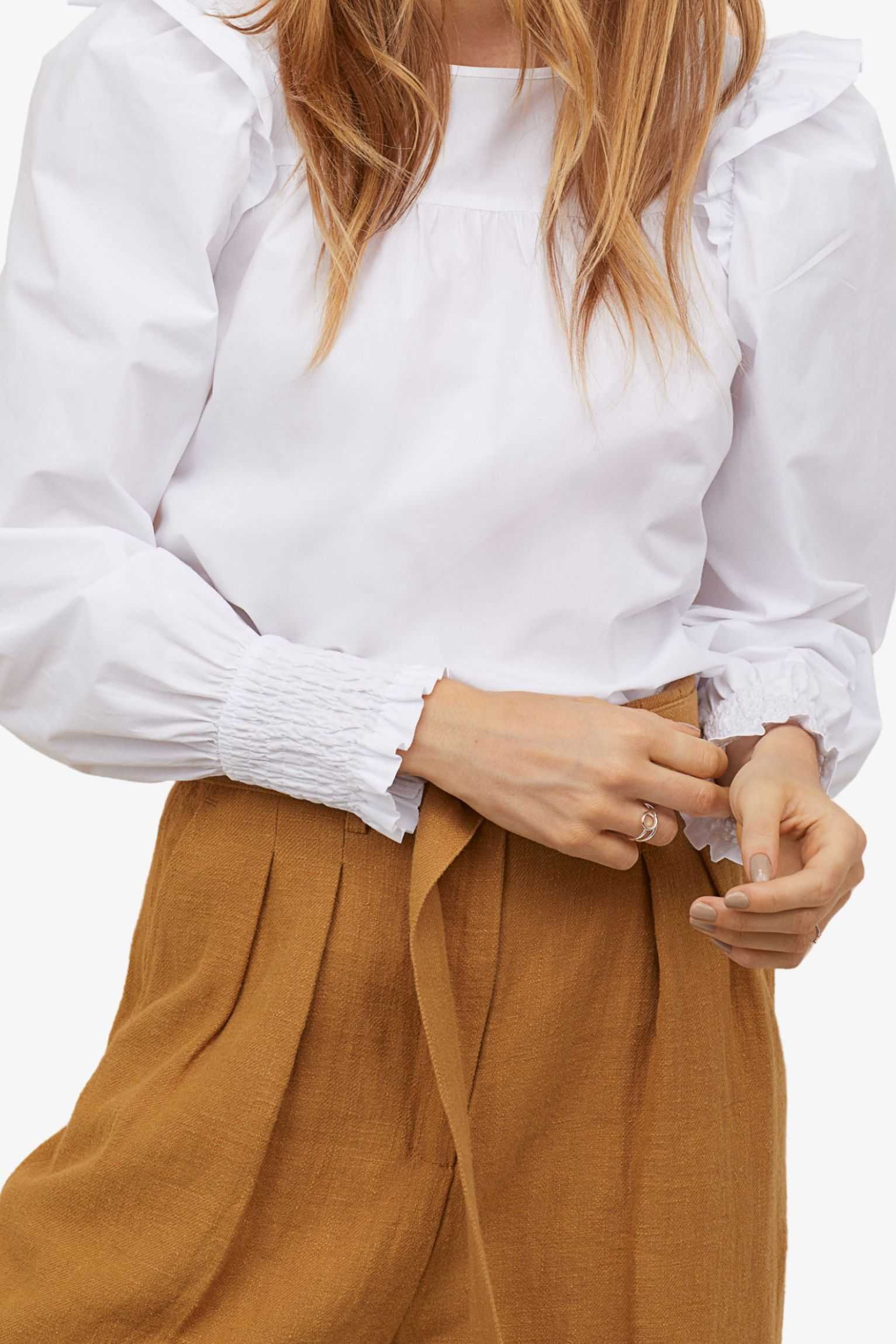 white ruffled smocked cuff blouse